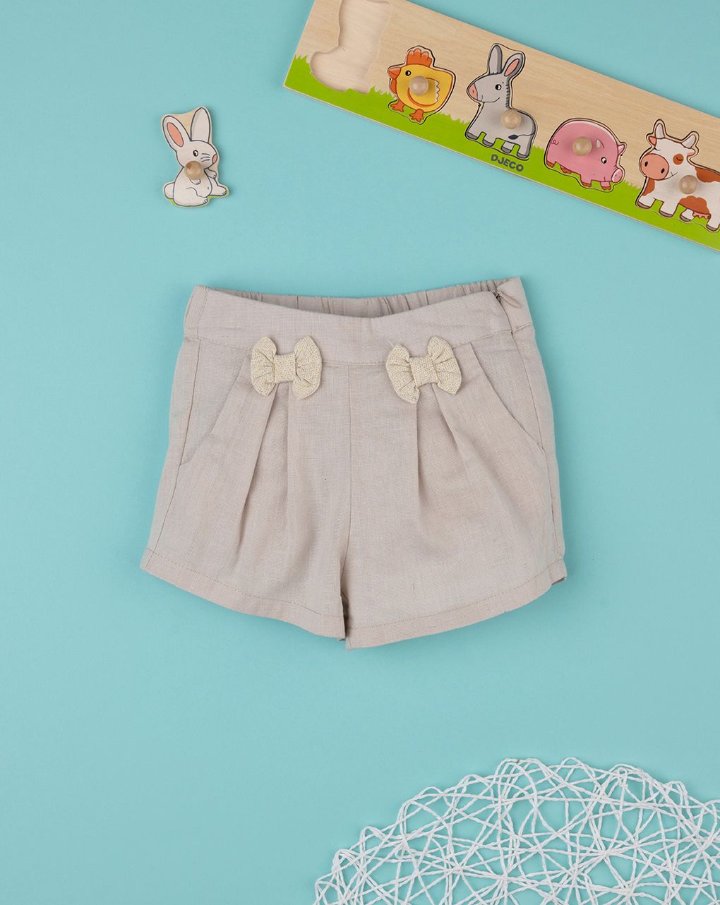 σορτσάκι λινό μπεζ με φιογκάκια για κορίτσι