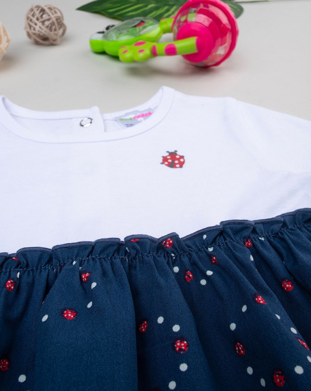 βρεφικό φόρεμα λευκό/μπλε με πασχαλίτσες για κορίτσι - Prénatal