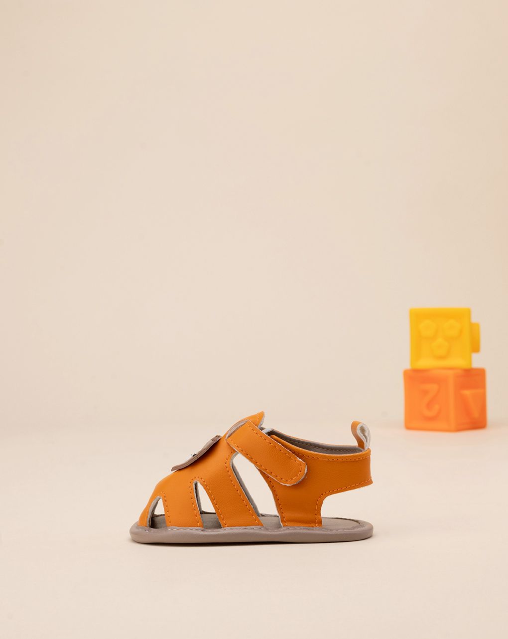 βρεφικά σανδάλια πορτοκαλί με λιονταράκια για αγόρι