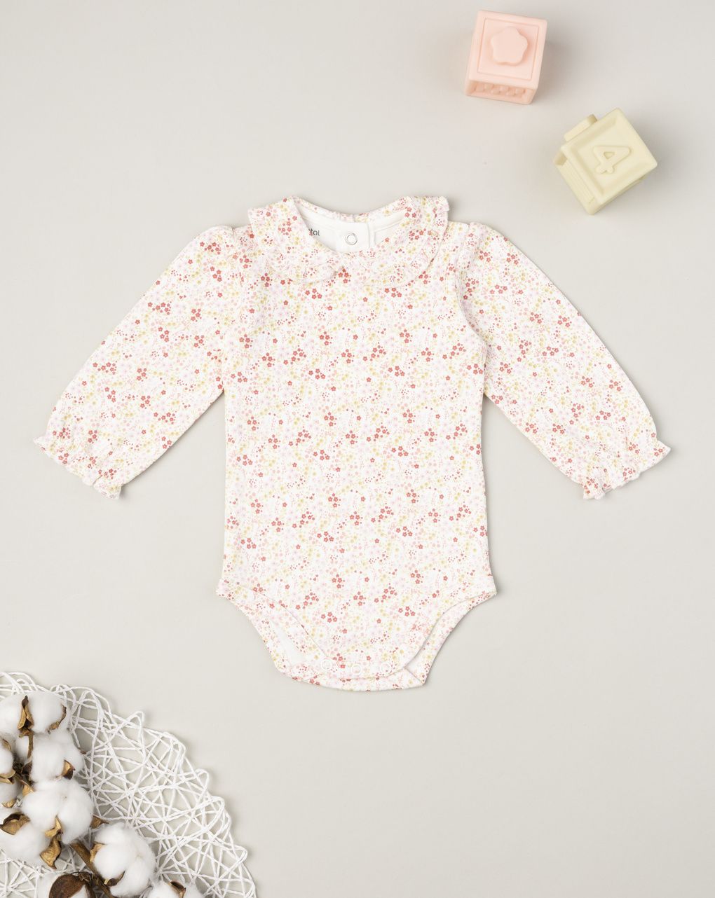 βρεφικό κορμάκι λευκό φλοράλ για κορίτσι