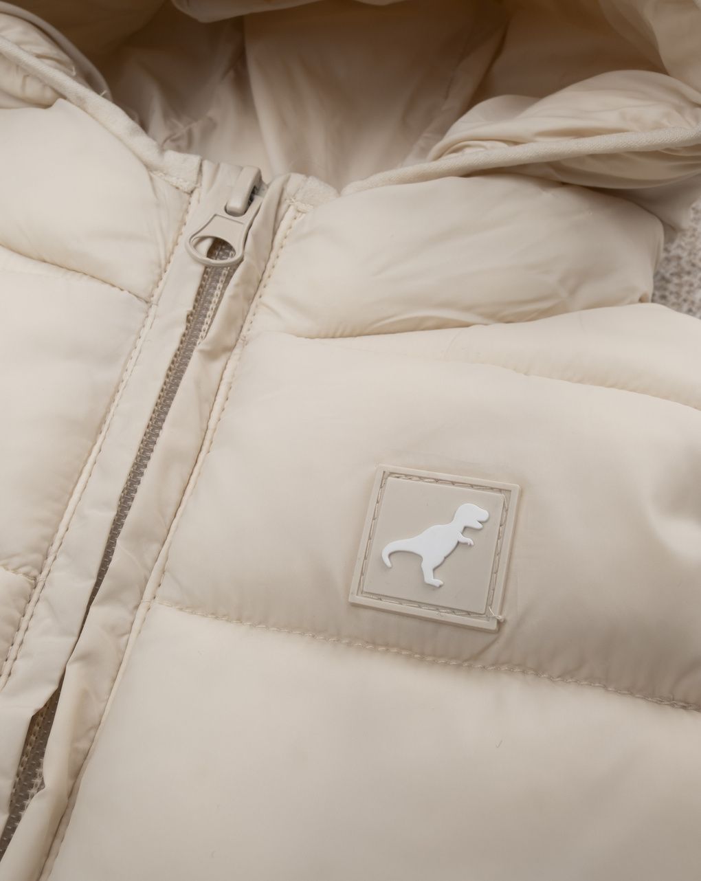 βρεφικό αμάνικο μπουφάν puffer κρεμ dino για αγόρι - Prénatal