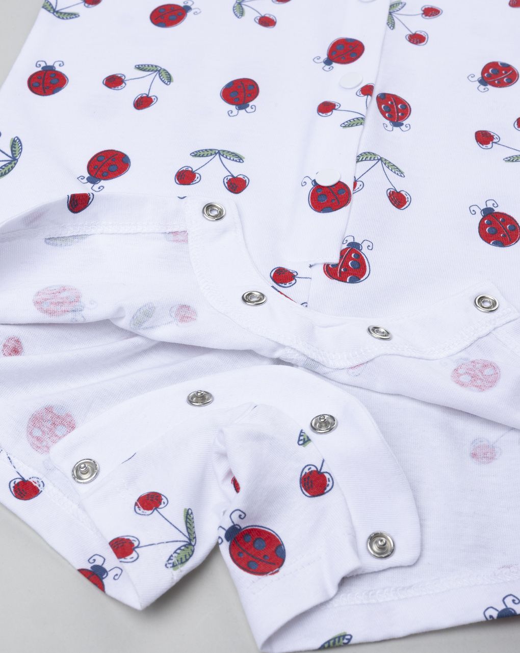 βρεφική ολόσωμη πιτζάμα λευκή με πασχαλίτσες για κορίτσι - Prénatal